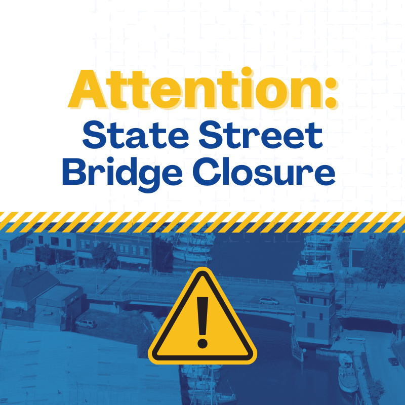 State Street Bridge Closure notice with a yellow caution sign and striped barrier above an aerial view of the bridge.