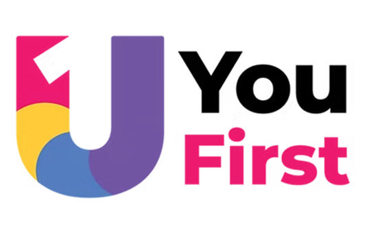You First logo. 'U' shape in pink, yellow, blue, purple. 'You First' text in black and pink.